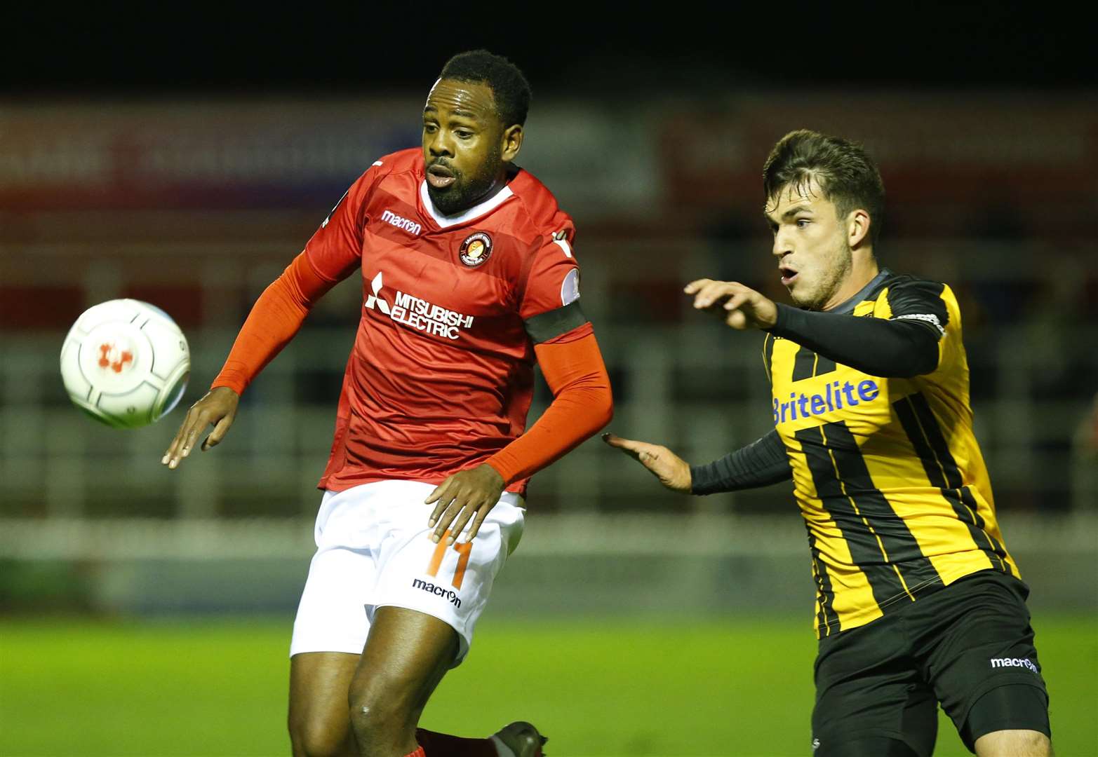 Fleet's Myles Weston and Maidstone full-back Jack Doyle do battle Picture: Andy Jones