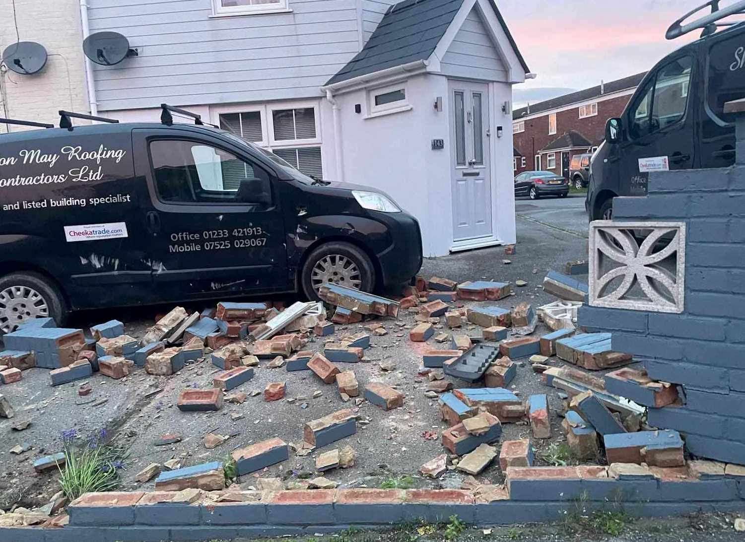 Part of a garden wall was demolished in the incident. Picture: Julia May