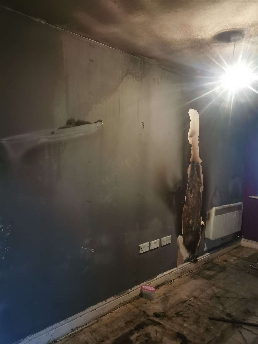 Charred walls of Alisha Taylor's flat in Fairfield Square, Gravesend, after the fire