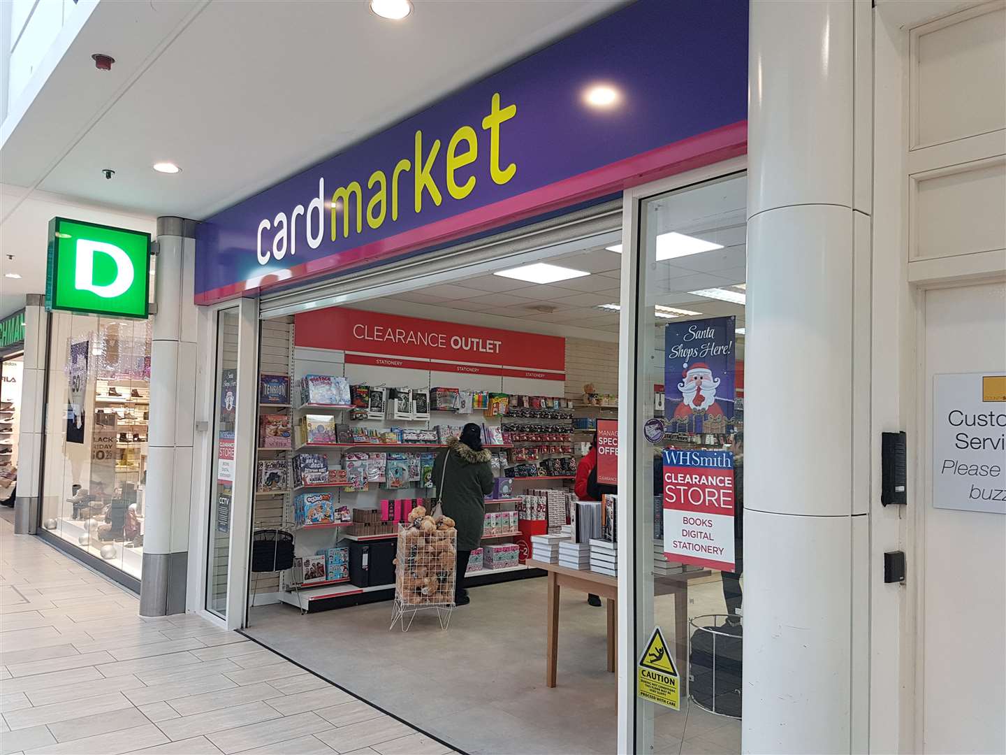 Despite still having Cardmarket's frontage, a sign has been posted on the door declaring it a WHSmith clearance store