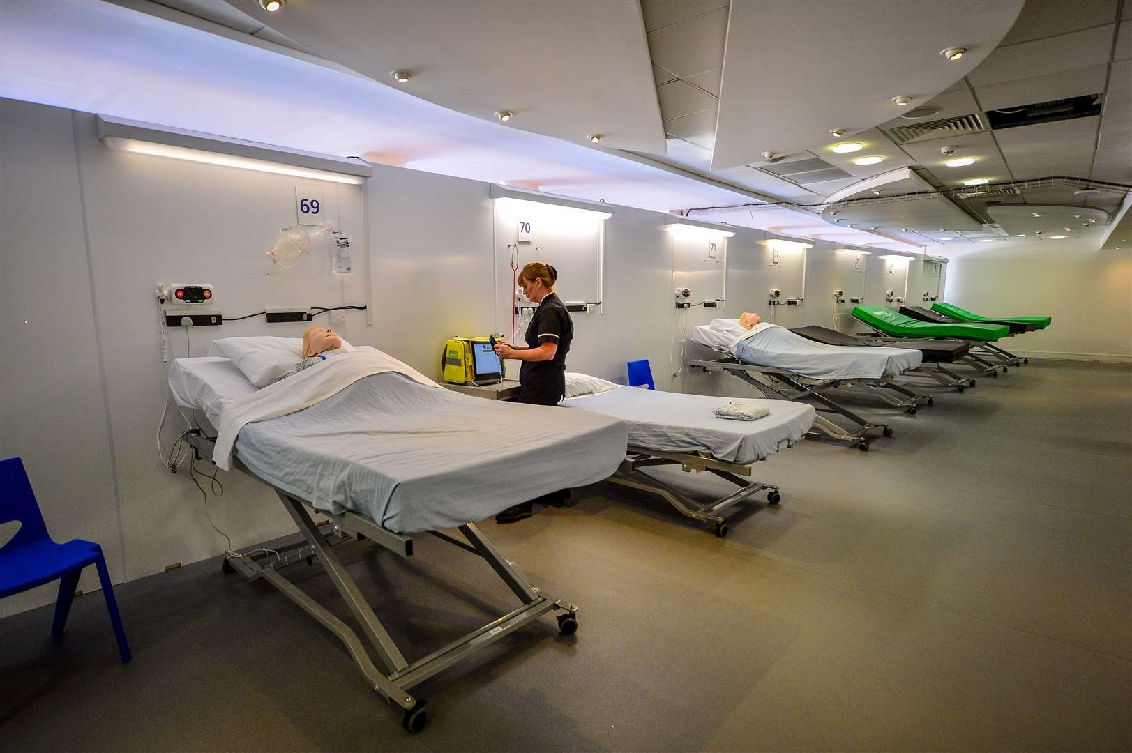 A simulation technician takes part in medical training inside a ward at the official opening of the new Dragon’s Heart Hospital, built at the Principality Stadium, Cardiff (Ben Birchall/PA)