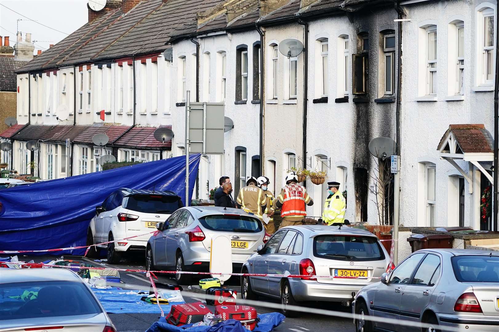 Emergency services at the scene in Sutton, south London (Aaron Chown/PA)