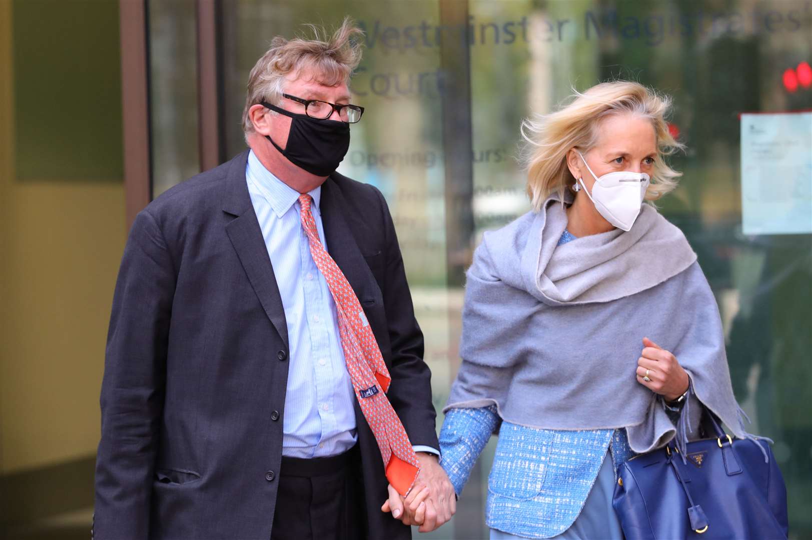 Hedge fund manager Crispin Odey, with his wife Nichola Pease (Aaron Chown/PA)