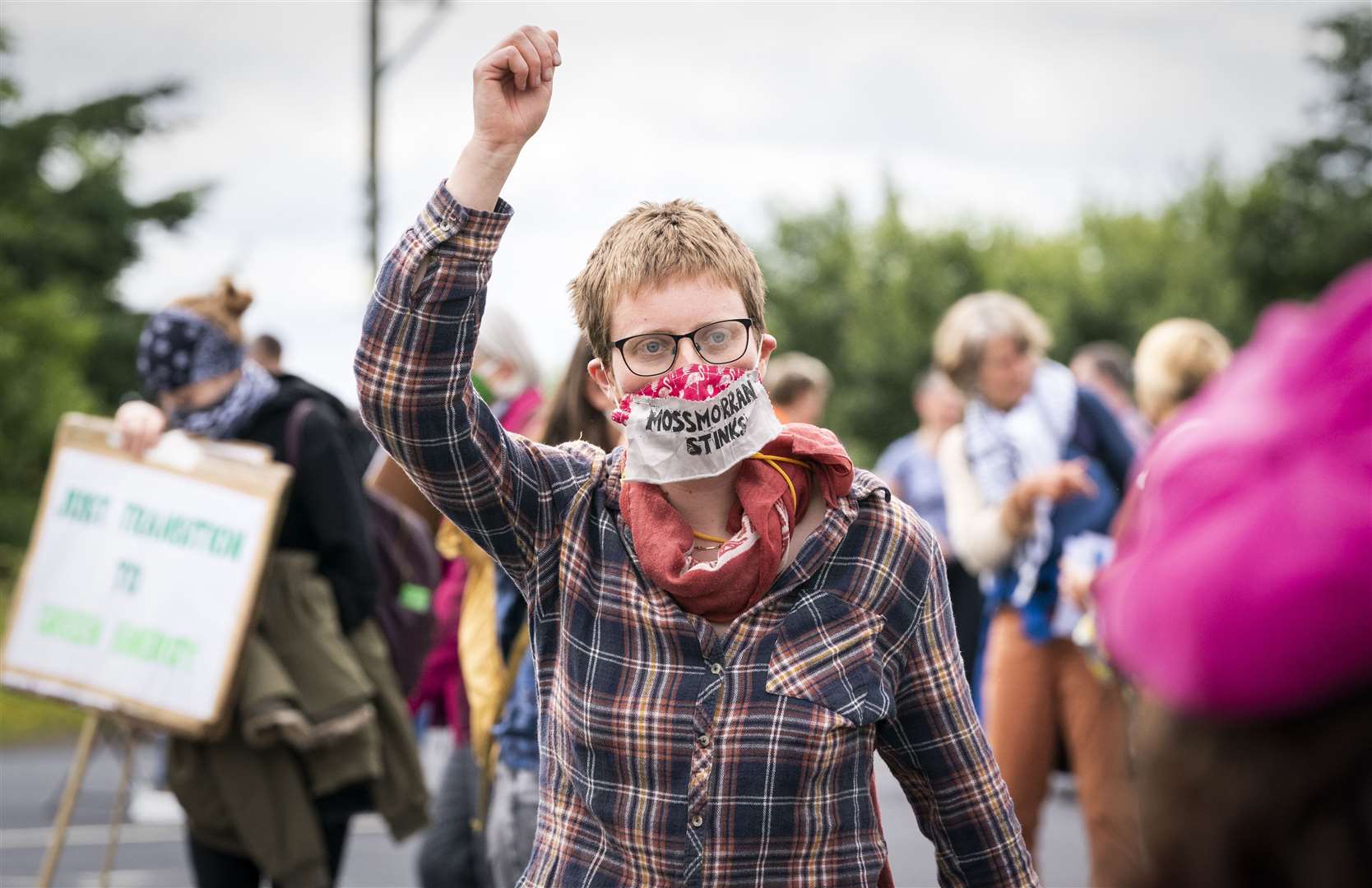 Climate activists demonstrating at the protest (Jane Barlow/PA)