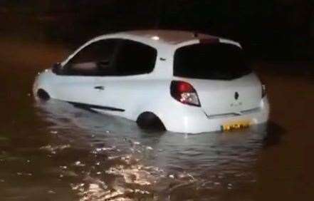 A car got stuck in the floods in Bearsted last night