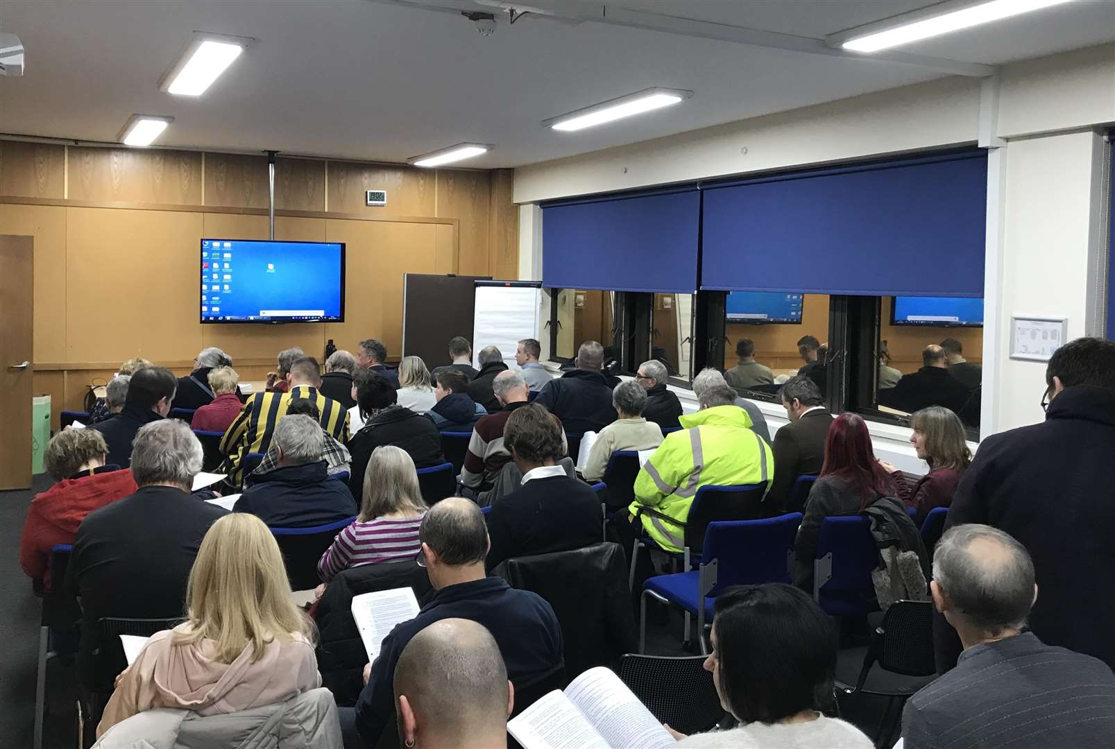 An 'overflow room' was also filled up after the public gallery reached capacity - even so, about 15 people were turned away