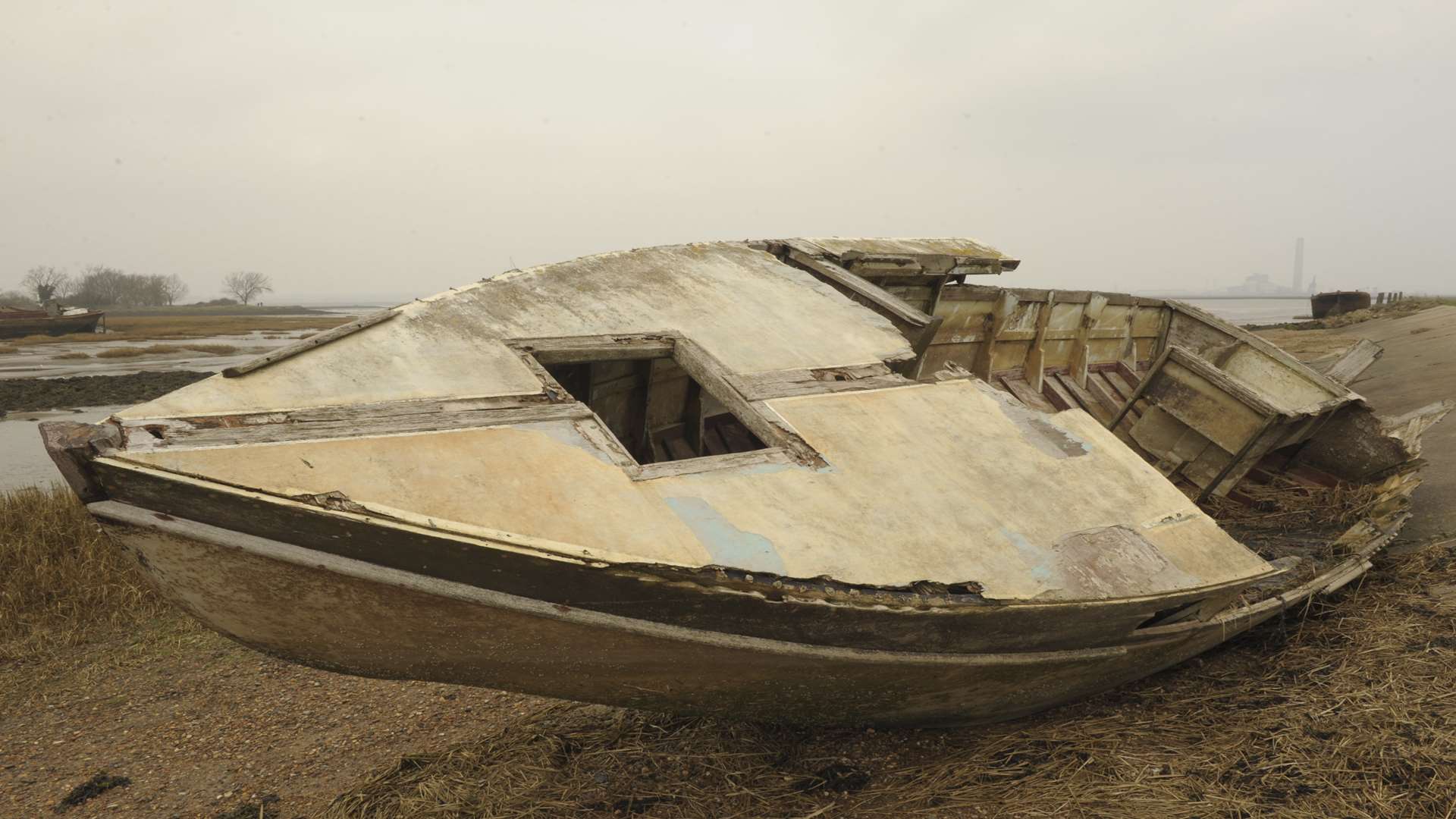 River Medway at Sharps Green/Horrid Hill, Lower Rainham. Boat graveyard. Rotting hulks and boats.