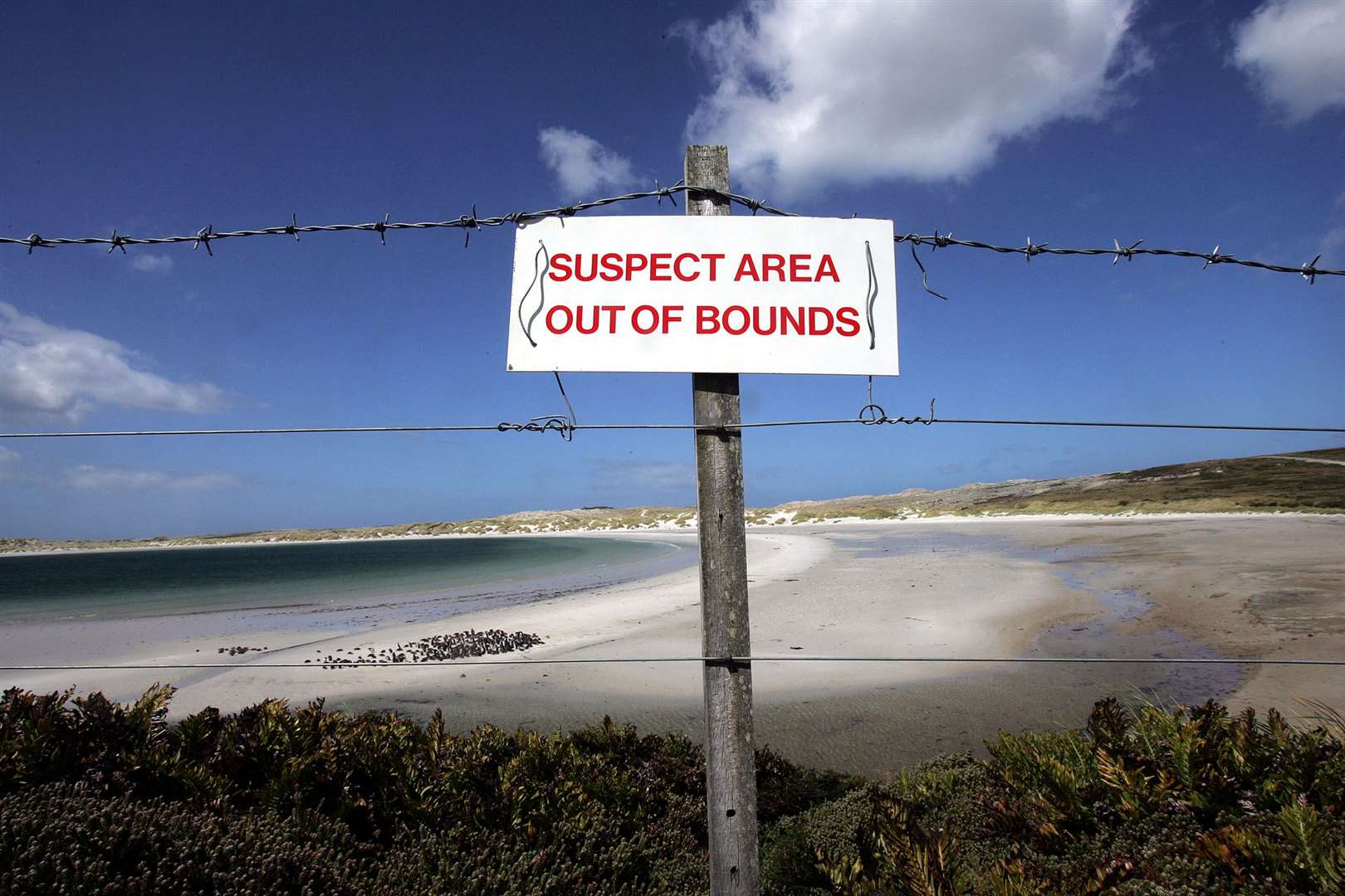 A sign warns of a minefield on the Falkland Islands (Cathal McNaughton/PA)