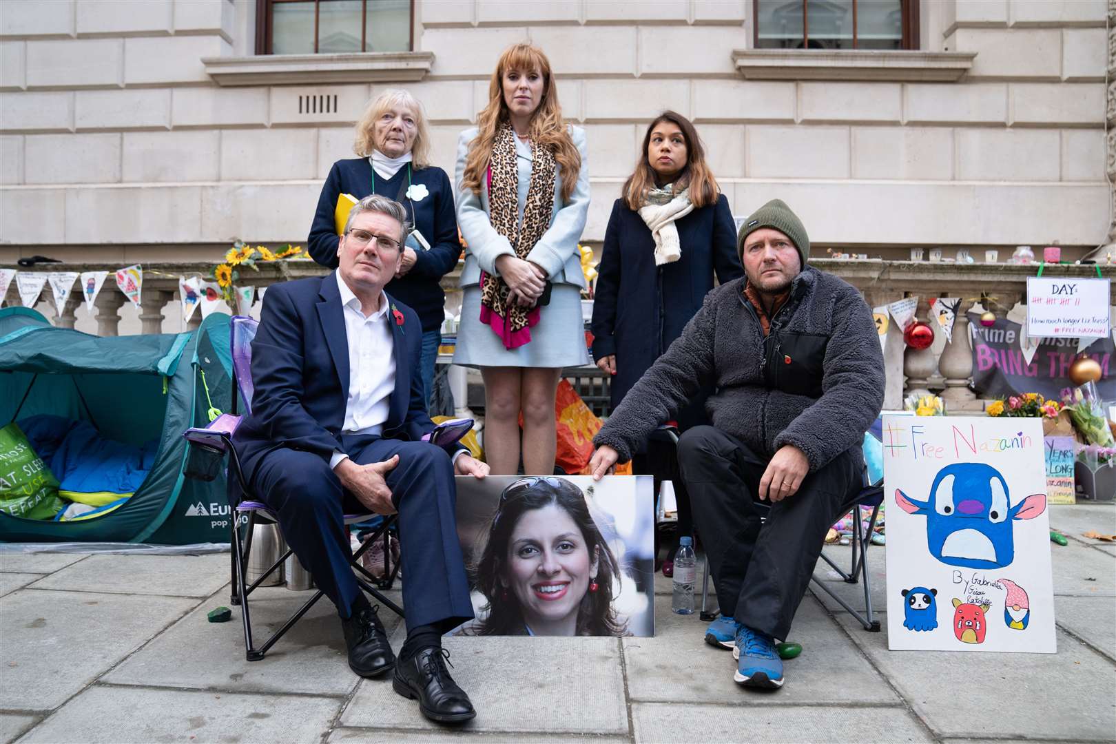 Sir Keir Starmer (front row left) accompanied by Labour MP Tulip Siddiq (back row far right) and Labour Deputy Leader, Angela Rayner (back centre) meet Richard Ratcliffe, (front row right) and his mother, Barbara (back row far left) (Stefan Rousseau/PA)