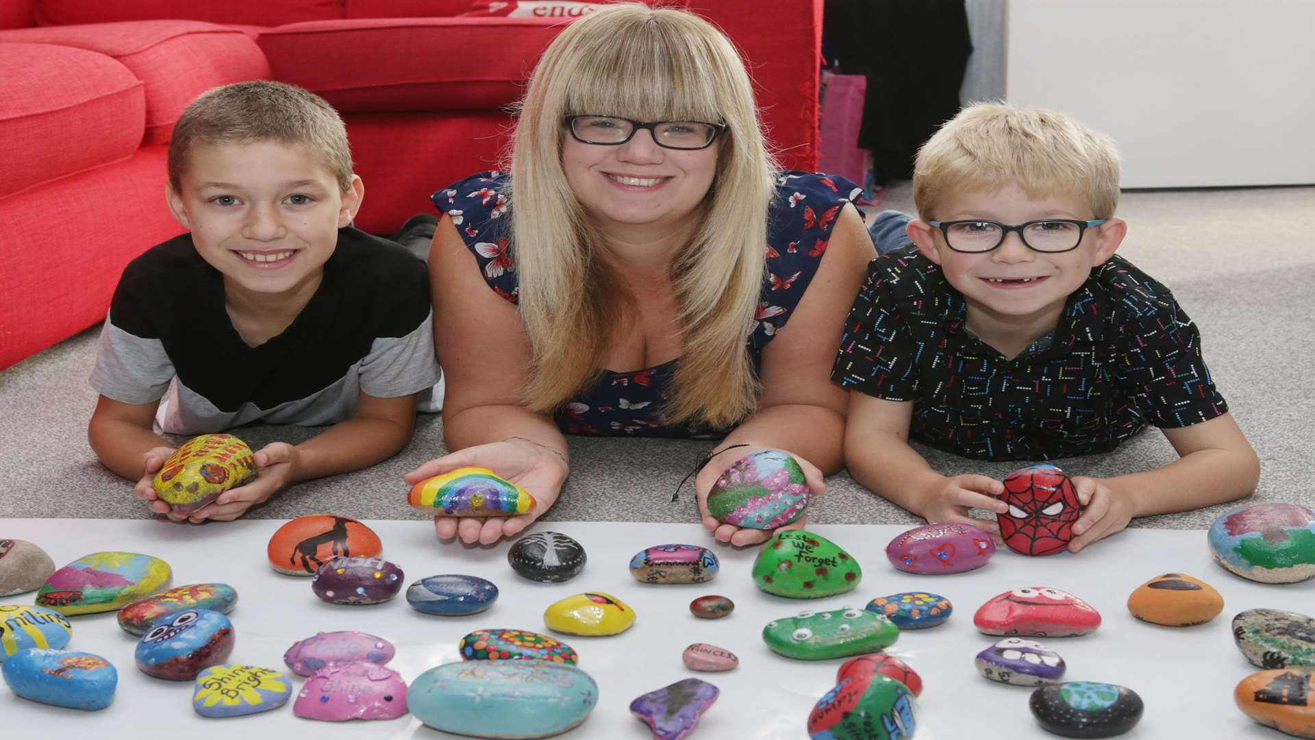 Kyle Hills, nine, with Mum, Tina and brother Toby, seven