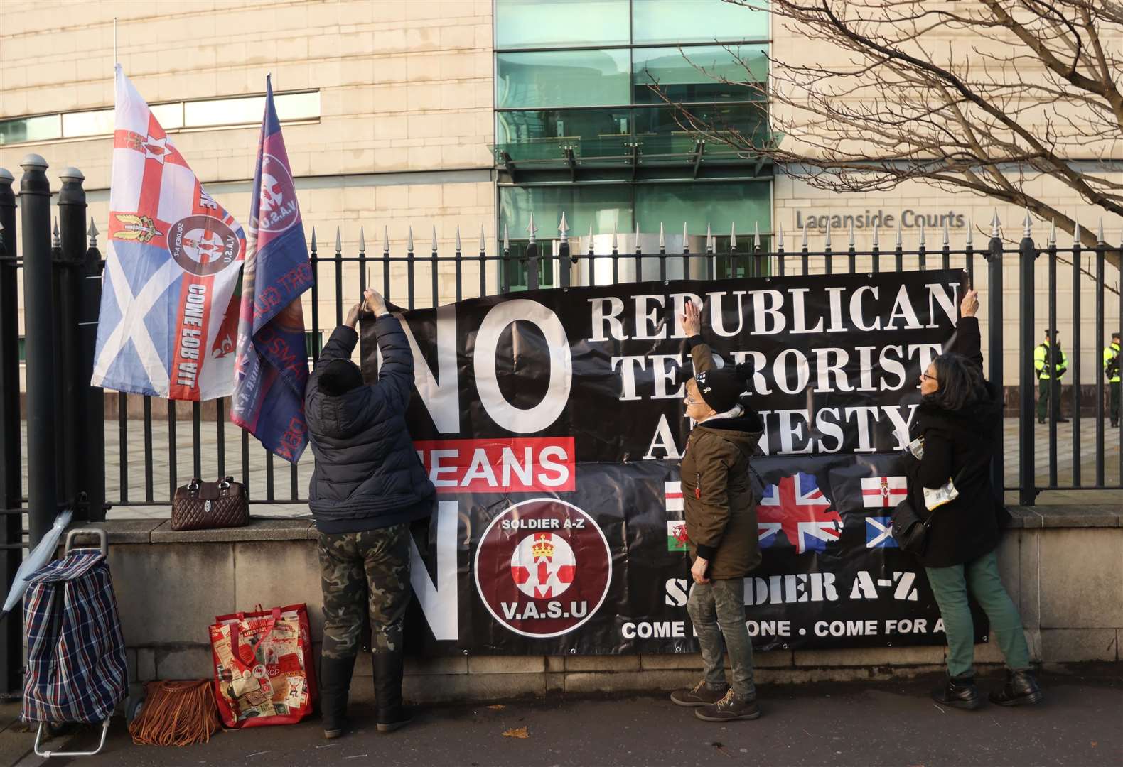 Supporters of David Holden outside Laganside Courts in Belfast on Friday (Liam McBurney/PA)