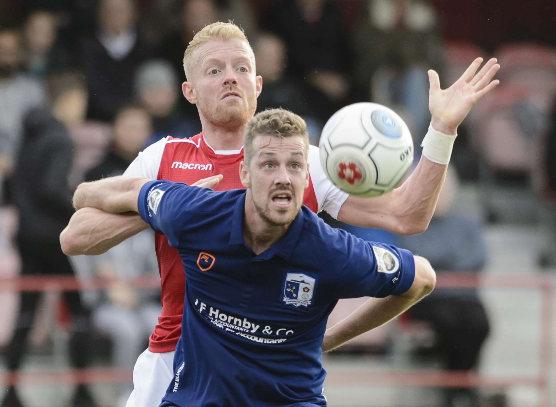 Kenny Clark in action against Barrow Picture: Andy Payton