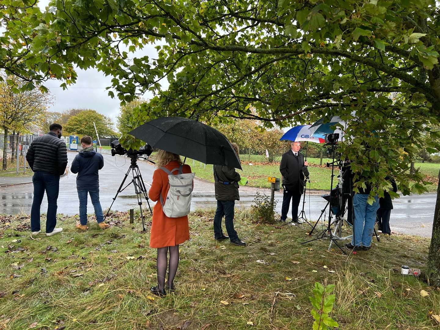 The gathering media await the Home Secretary's arrival at Manston's immigration centre