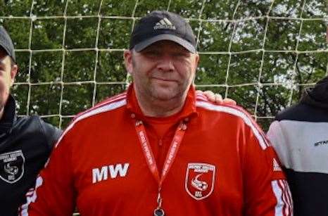 Matt Waters (centre) with the coaches of Medway Soccer Academy. Picture: Matt Waters