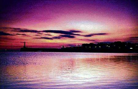 Sunset over the harbour at Margate