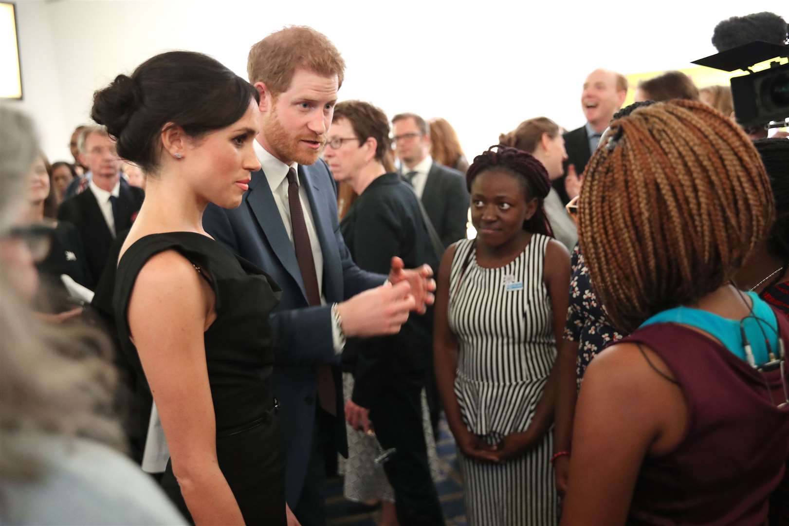 Meghan and Harry speak to guests at a women’s empowerment reception during the Commonwealth Heads of Government Meeting in 2018 (Chris Jackson/PA)