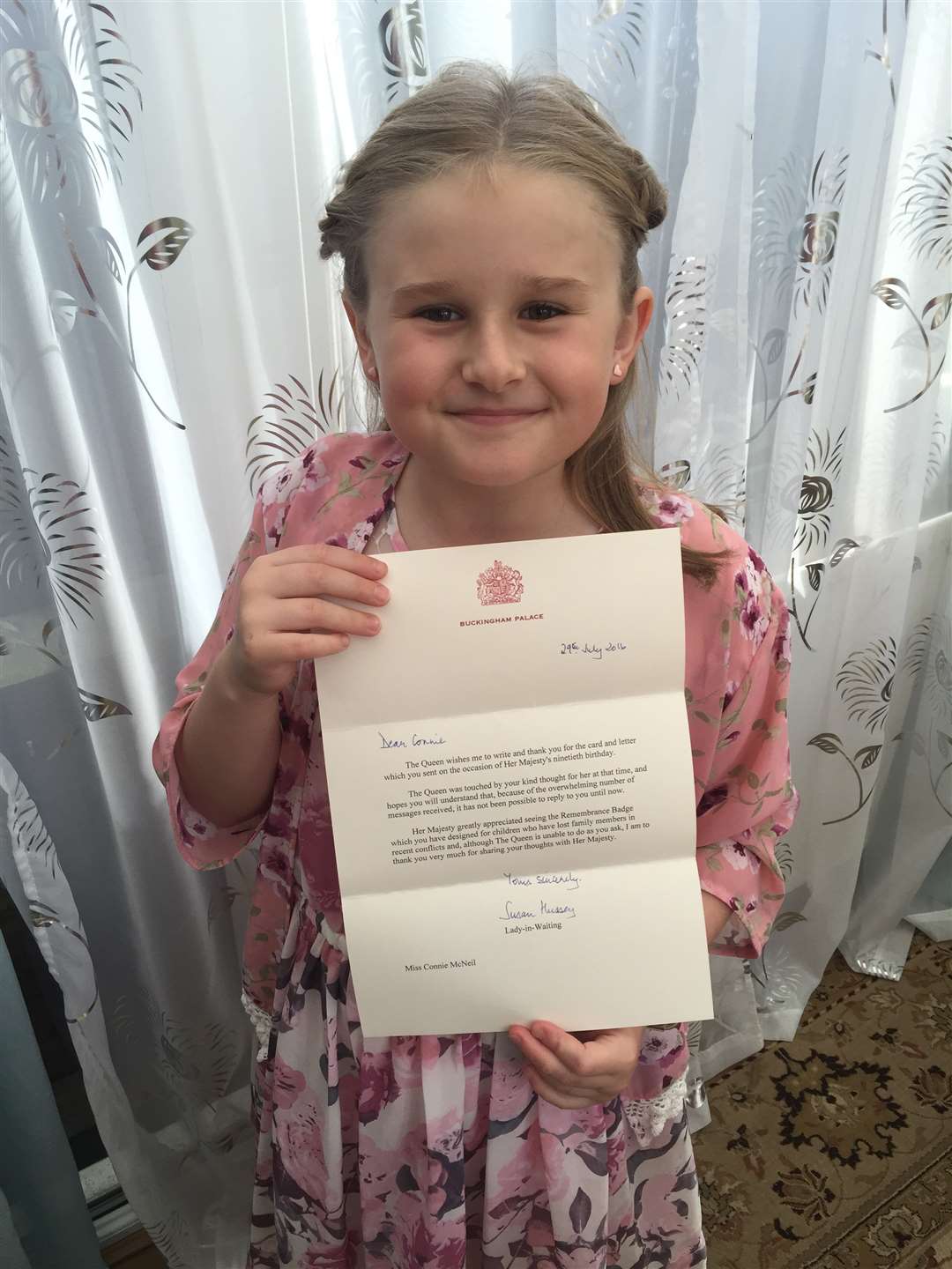 Connie Roberts-McNeil with her letter from the Queen