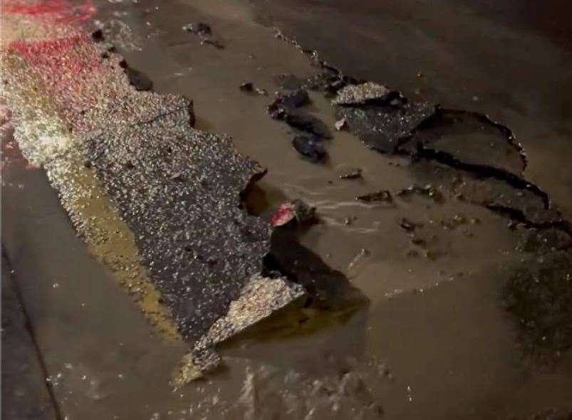 A crater was left behind after the bus drove through Preston Street in Faversham. Picture: Oscar's Bakery