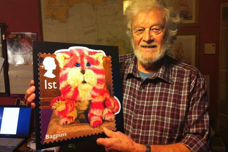 Bagpuss creator Peter Firmin with a giant stamp