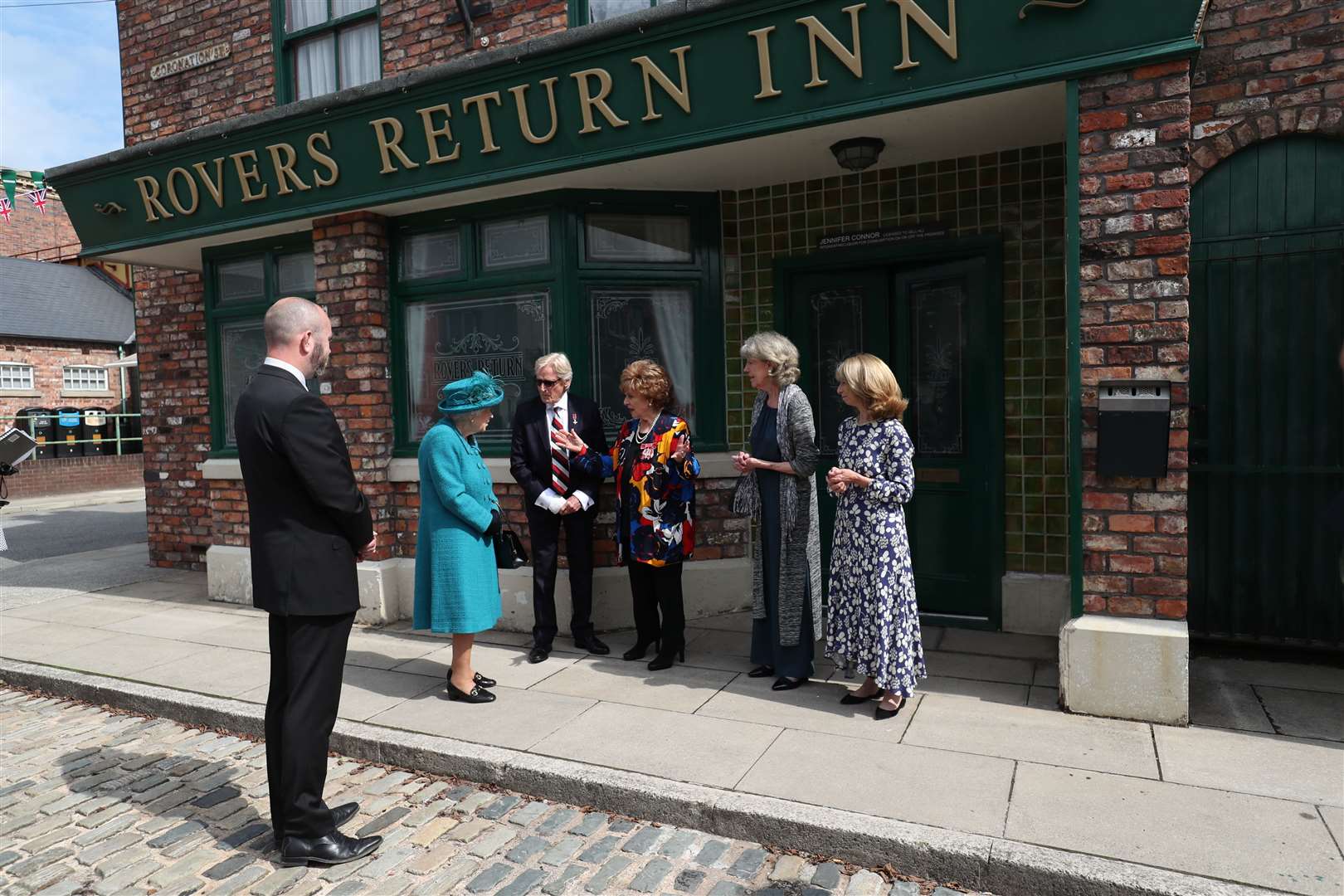 The Queen meets actors (left to right) William Roache, Barbara Knox, Sue Nicholls and Helen Worth, outside the Rovers Return (Scott Heppell/PA)