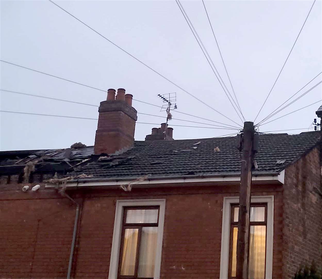 The scene on Wilson Street in Derby, where the wind had blown the roof from a building causing damage to five other properties (Derbyshire Fire and Rescue Service/PA). 