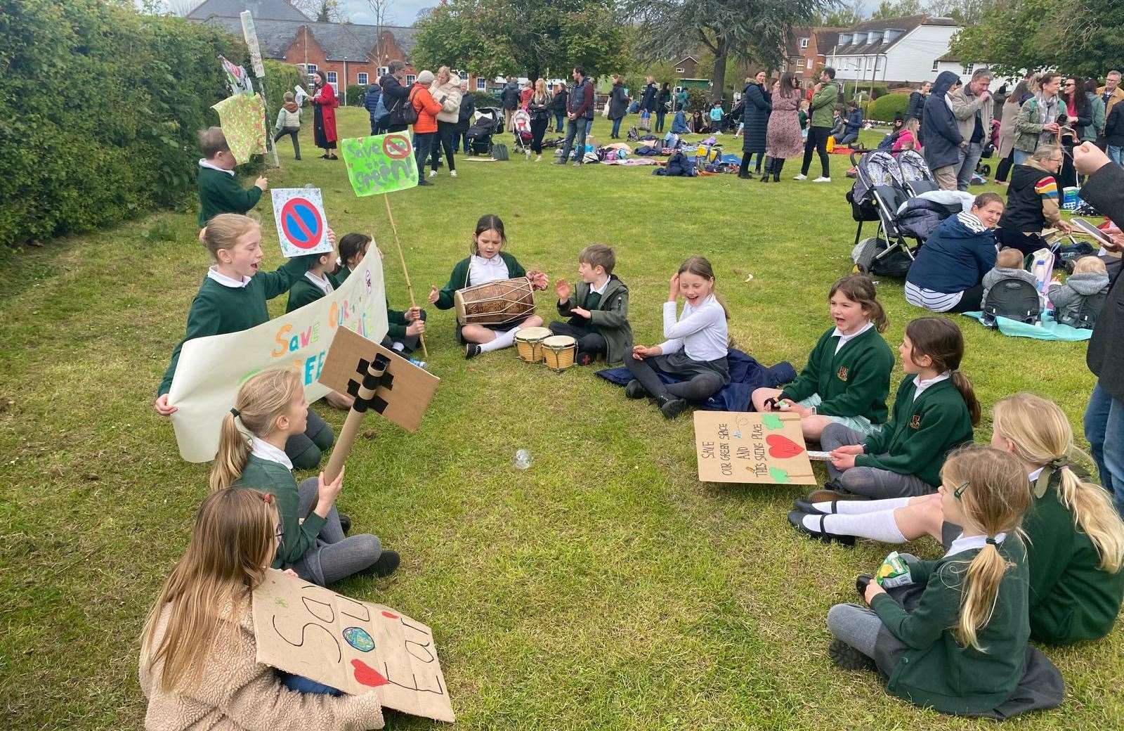 The children enhanced their protest with bongo playing