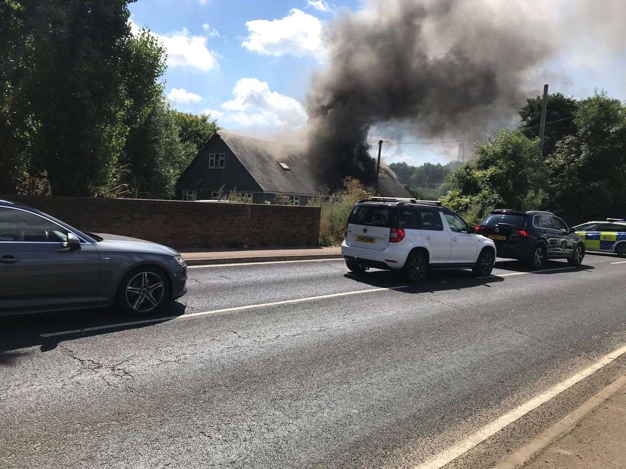 Smoke billowing from the house in Sturry on Friday. Picture: Marc Stallwood