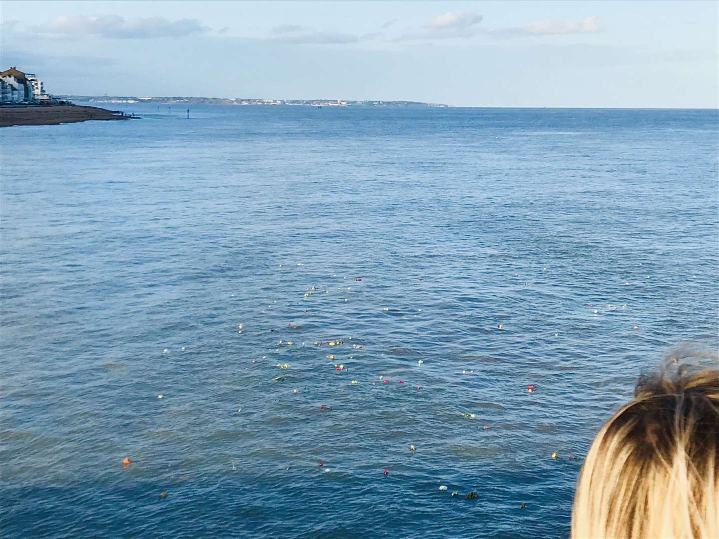 The flowers thrown into the sea in memory of Debbie Griggs float towards Ramsgate