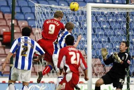 Gary Mulligan's scores Gillingham's goal. Picture: MATTHEW READING