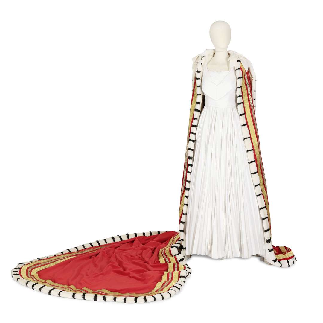 Coronation ordaining dress, gold mantle and red cloak from season one episode five, a replica of the coronation garments designed for and worn by the late Queen (Bonhams)