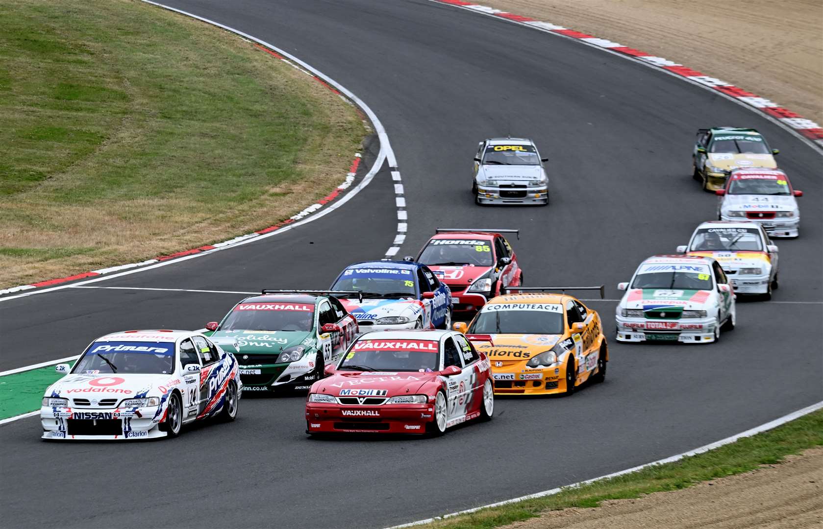 Hill leading the Super Touring pack before the start of Saturday’s second race. Picture: Simon Hildrew
