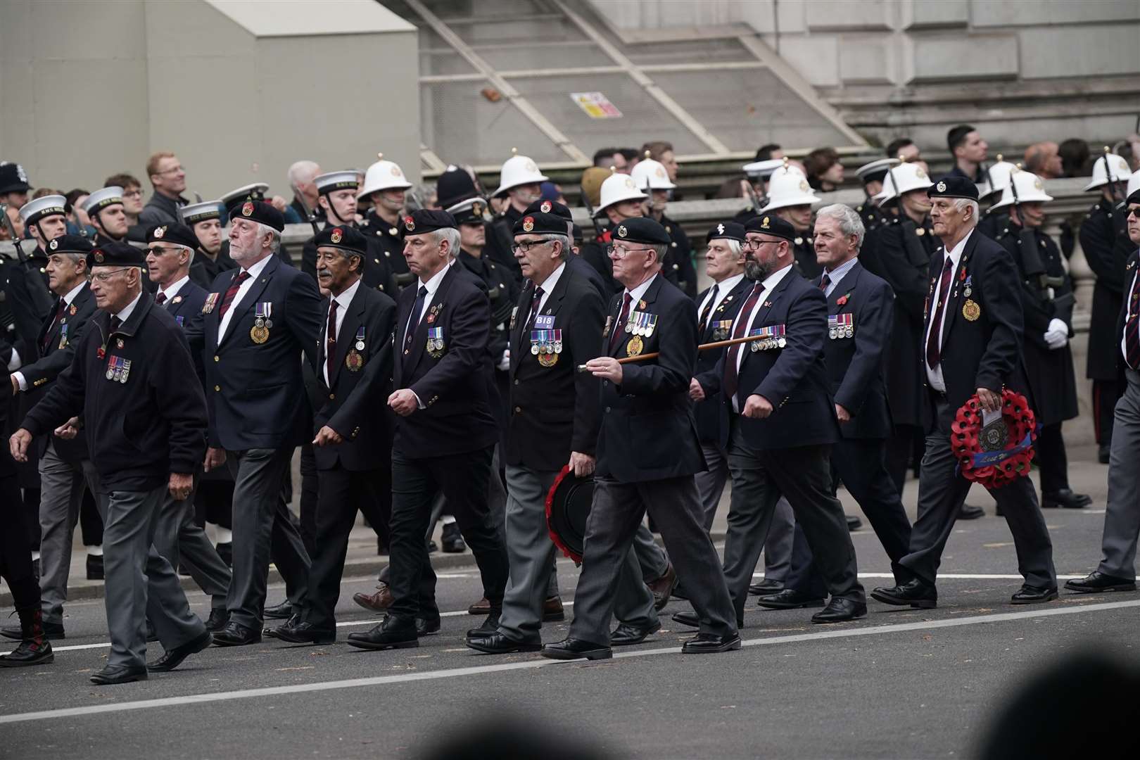 Thousands of veterans proudly wearing their medals march past the Cenotaph (Yui Mok/PA)