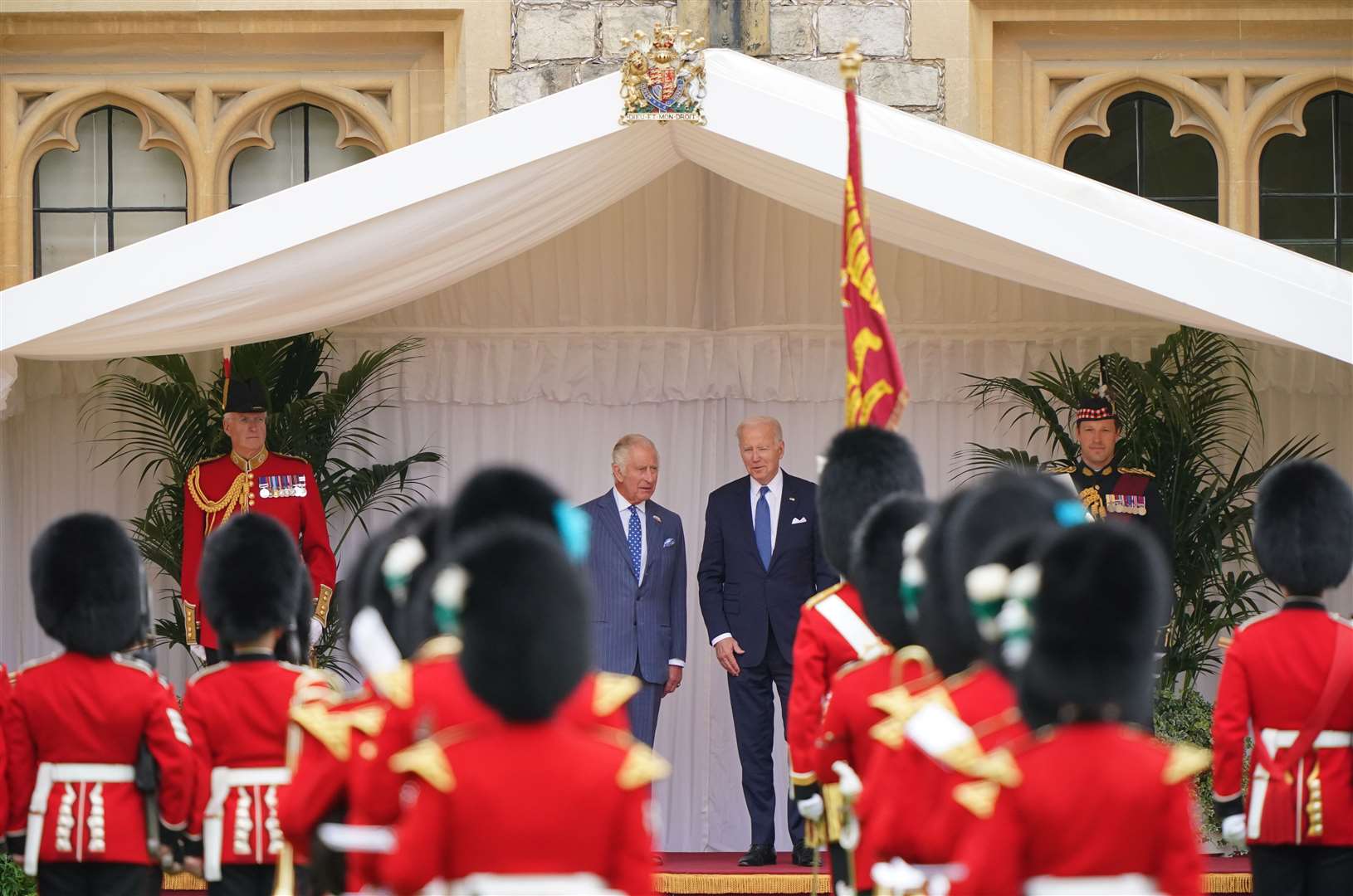 The King and US president Joe Biden inspect the Guard of Honour from the Prince of Wales’s Company of the Welsh Guards (Jonathan Brady/PA)