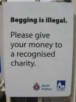 The sign put up to discourage giving to beggars