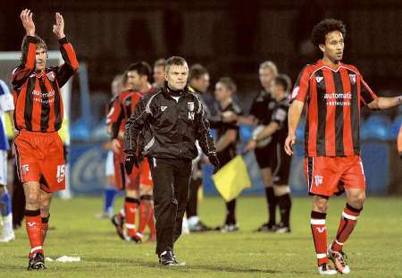 Andy Hessenthaler and the Gills players leave the field victorious