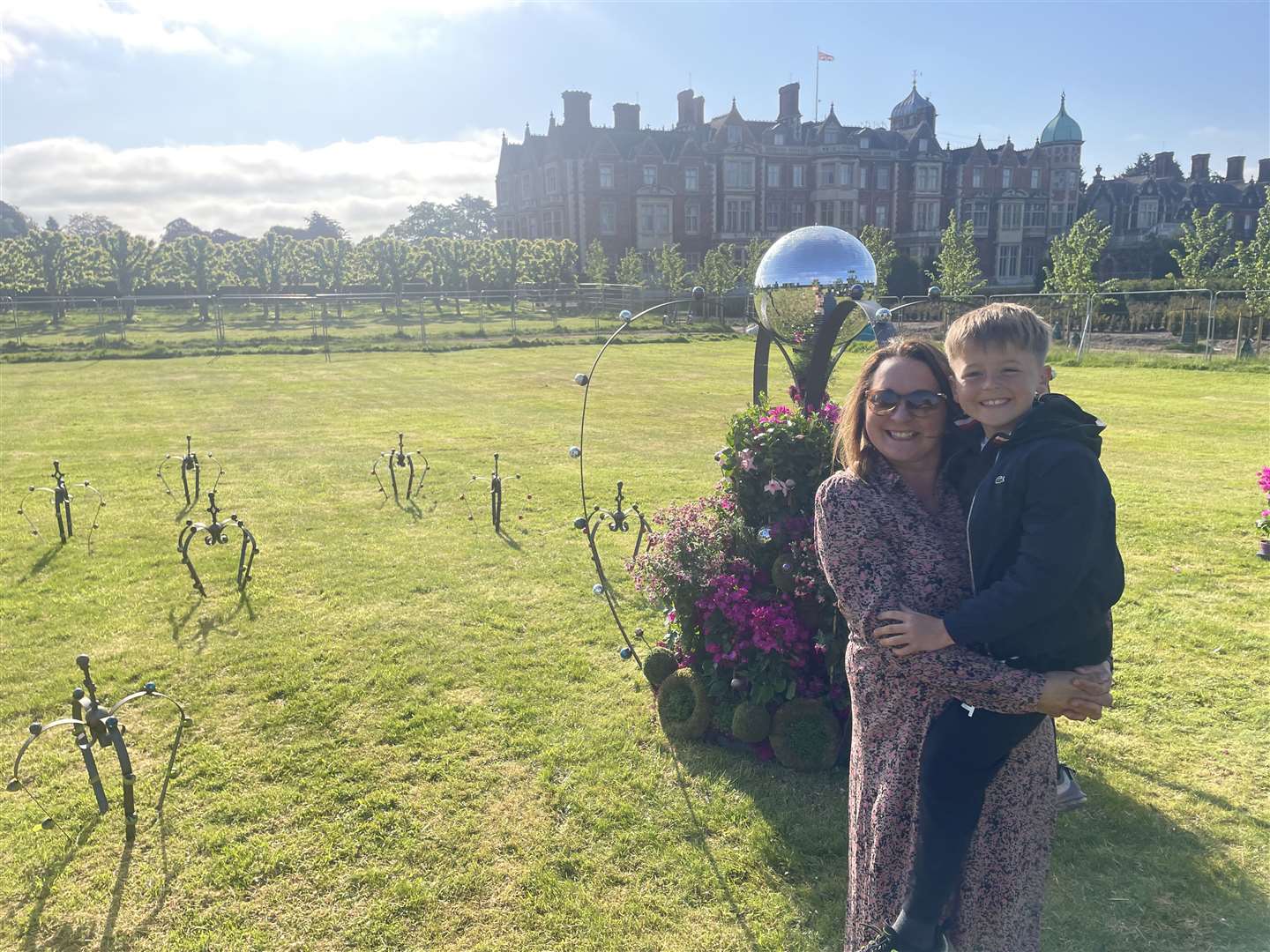 Victoria Osborne and her son Lochlan with crowns that L V Bespoke, the firm she founded with her husband, made for the Sandringham Estate (L V Bespoke/PA)