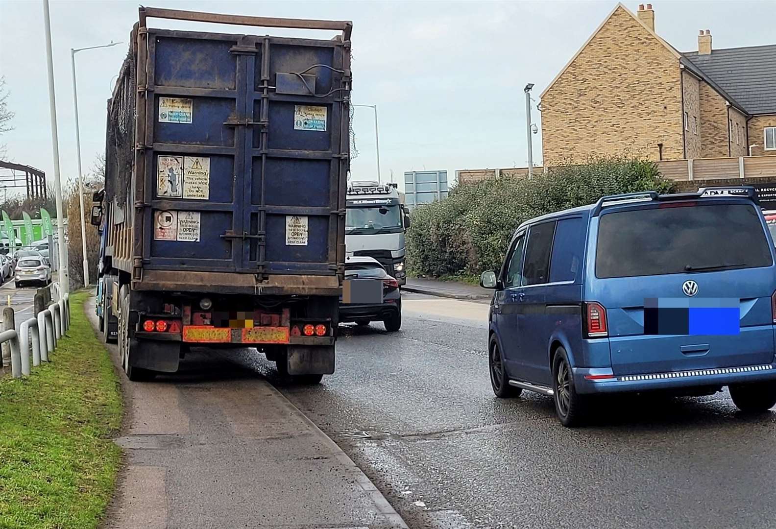 The lorries parked on the path by APM Metals scrap yard. Picture: Zack Clout-Bonner