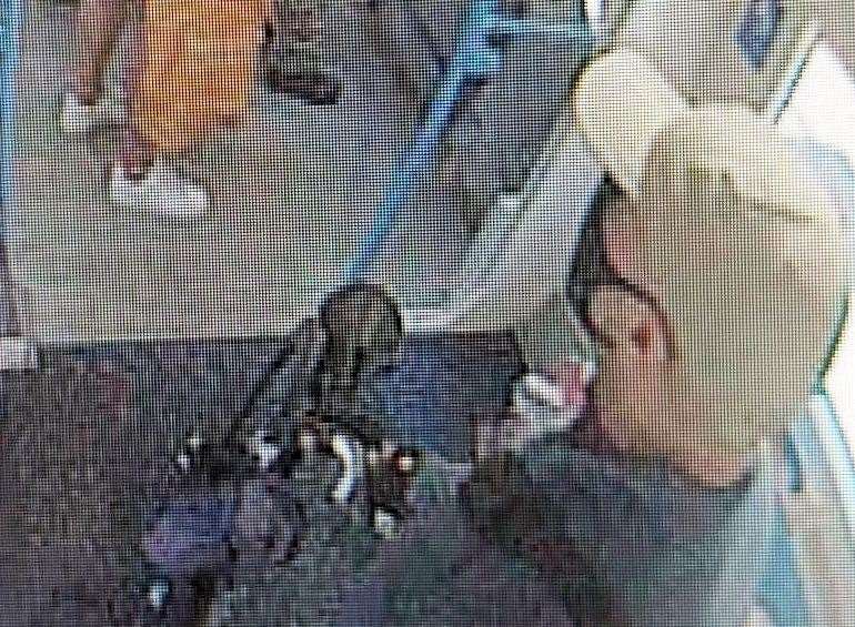 The man police want to speak to captured on CCTV on a train on the day of the robbery. Picture: Kent Police