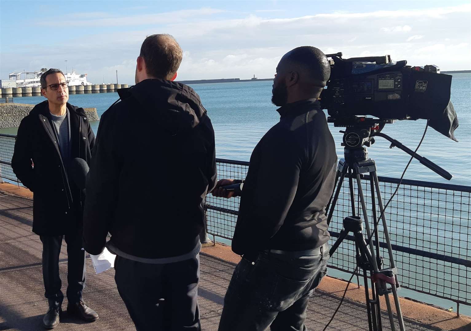 A national TV crew interviews Enver Solomon of the Refugee Council. Picture: Sam Lennon