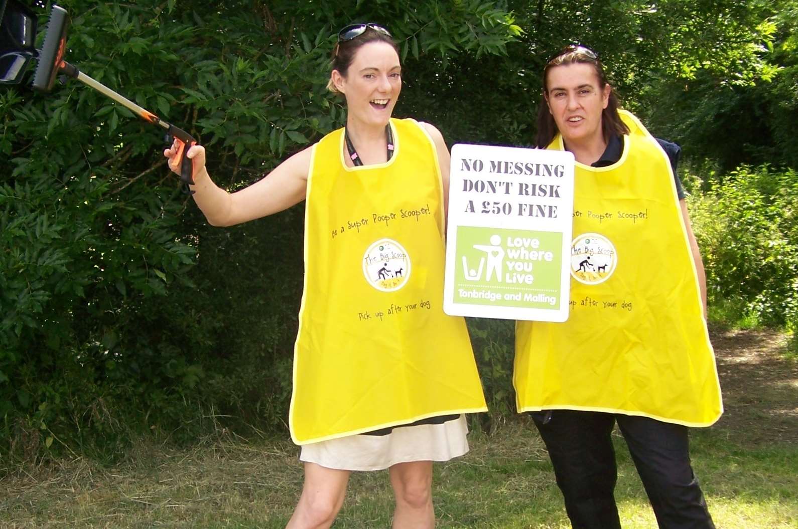 Tamsin Ritchie, the Borough Council’s Environmental Projects Coordinator and Dog Warden Lorraine Baseden, with 18 bags of dog mess collected from the footpath in Leigh Road, Hildenborough.