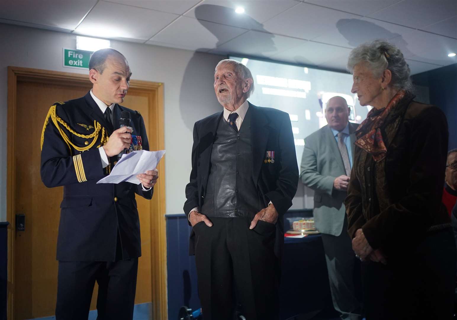 Colonel Xavier Ravel (left) surprises David Morgan (centre) as Arlette Gondree looks on (Yui Mok/PA)