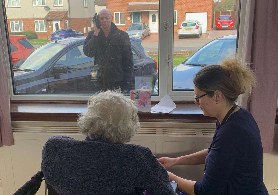Resident, Joan and son talk on the phone at Dene Holm Residential Care Home in Northfleet (32308063)