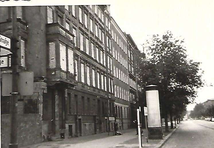 These buildings in Bernauer Strasse stood in East Berlin but opened onto West Berlin. Here the windows have all been shuttered up leaving just a small slit for the East German police to peer through onto the West