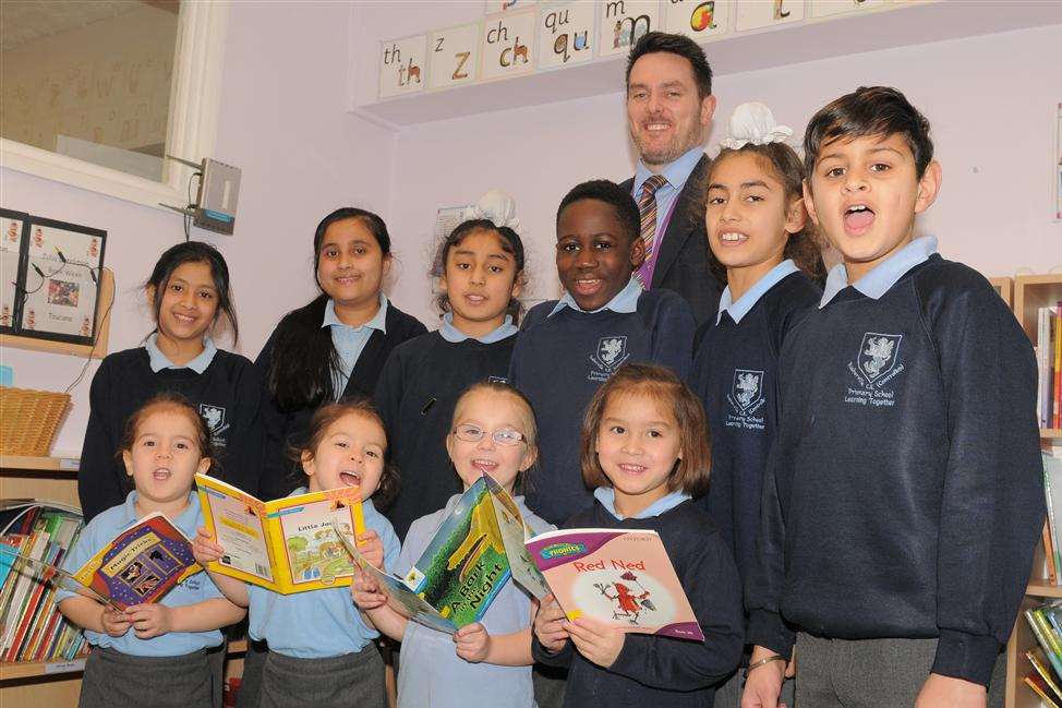 Rosherville head Robert Cochrane with pupils