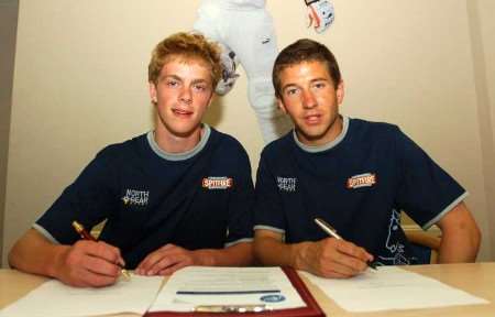 PUTTING PEN TO PAPER: Sam Northeast (left) and Paul Dixey sign their contracts. Picture: BARRY GOODWIN