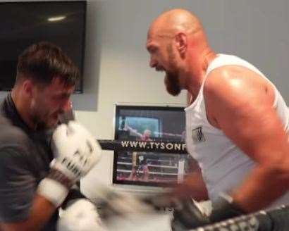 WBC Heavyweight champion, Tyson Fury and his brother Tommy in the ring