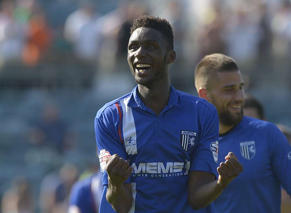 Emmanuel Osadebe celebrates Gillingham's win against Sheffield United on his Football League debut Picture: Barry Goodwin