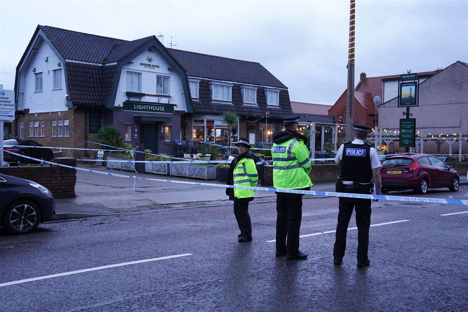 Police at the Lighthouse Inn in Wallasey Village, after the shooting (Peter Byrne/PA)