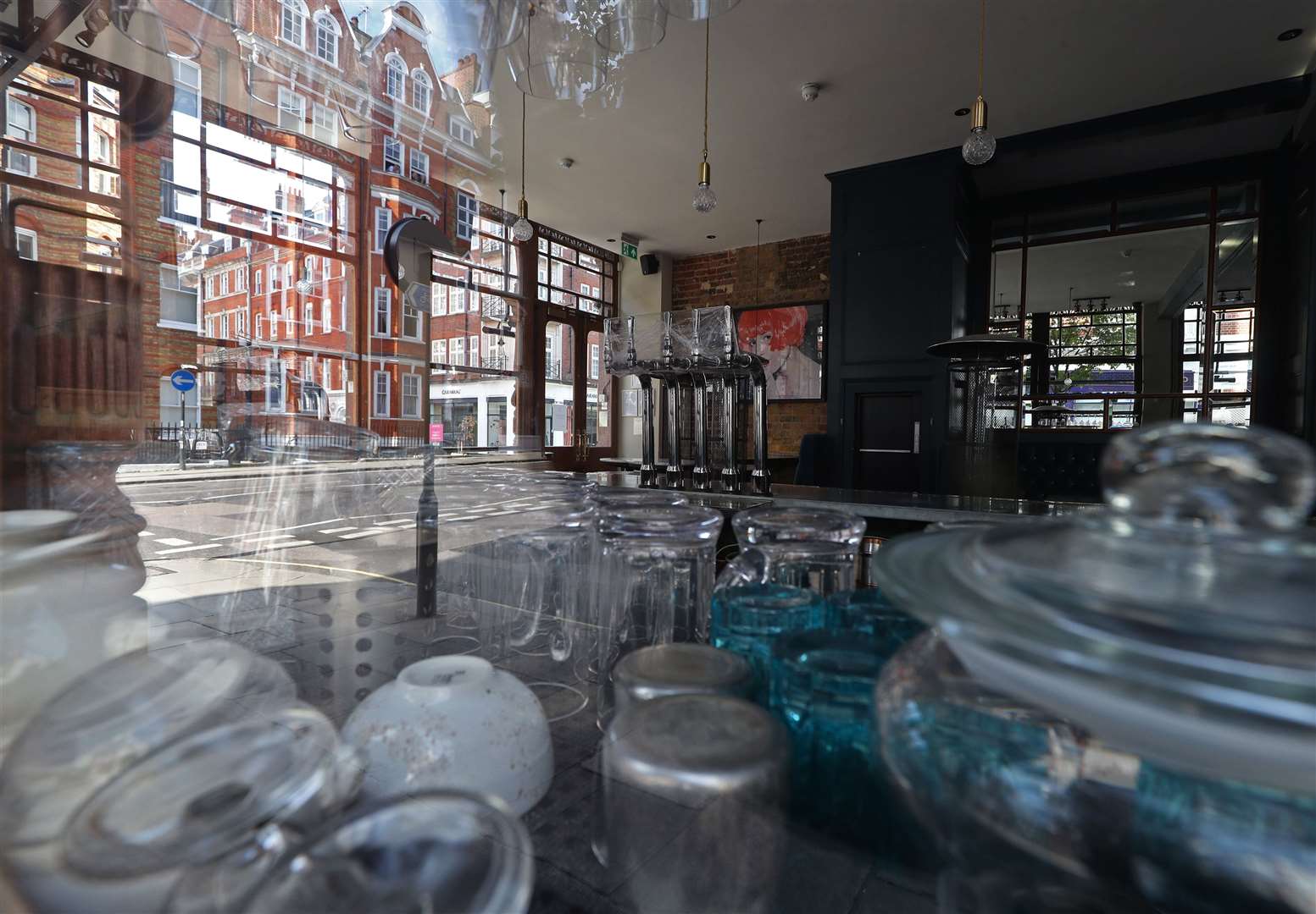 The empty interior of a pub which remains closed due to the coronavirus pandemic (Yui Mok/PA)