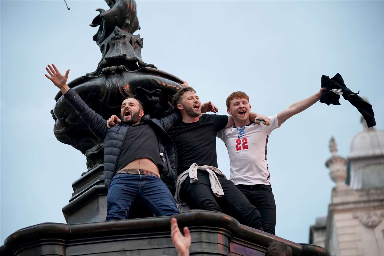 England football fans in Piccadilly Circus celebrating England’s victory over Germany (Yui Mok/PA Images)